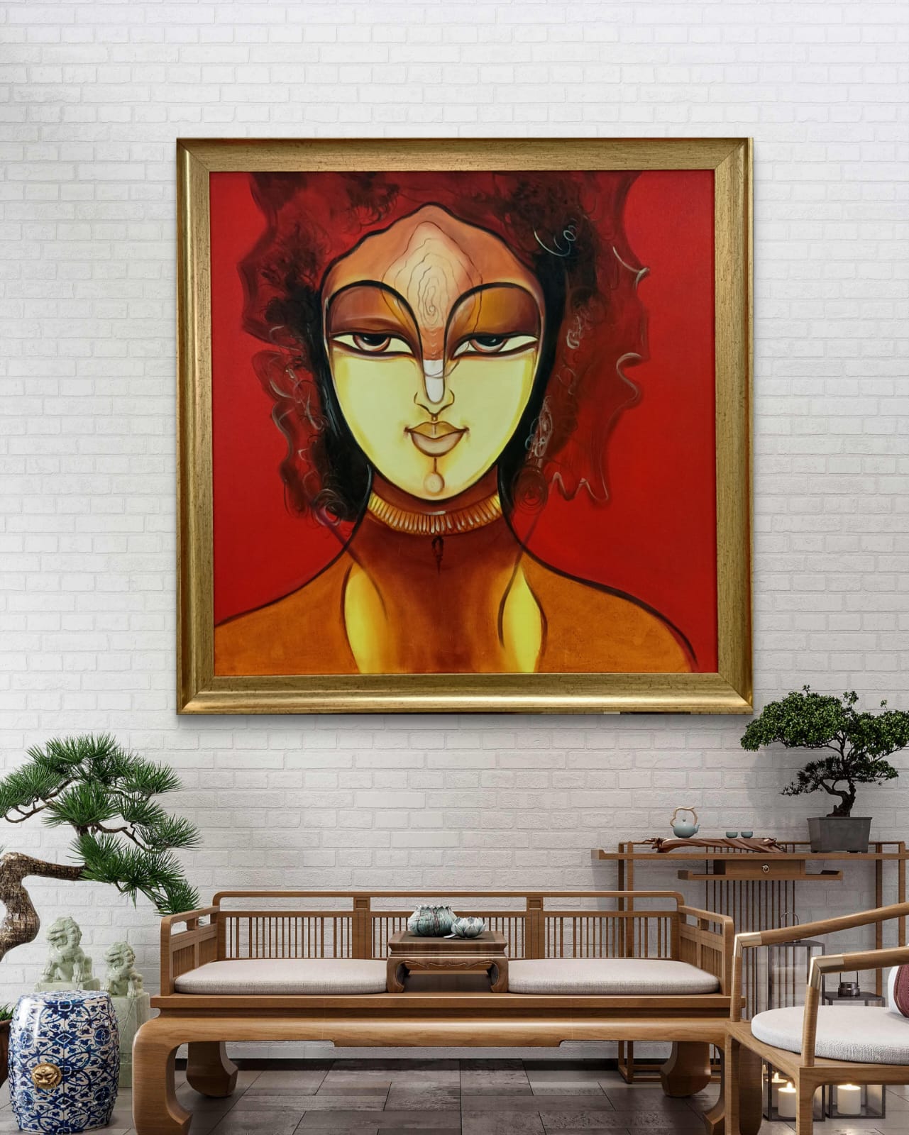 Divine Feminine Aura artwork on white tiled wall with indian style wooden sofa below