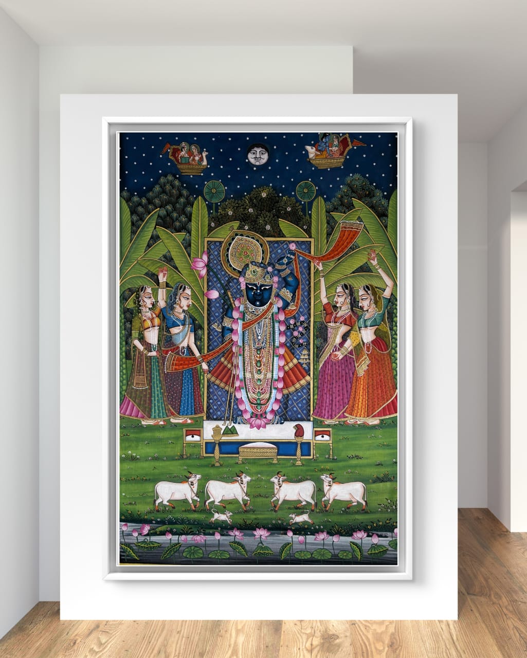 Pichwai Shrinath Ji 6 Shrinath Ji’s Divine Celebration artwork on white wall with wooden flooring